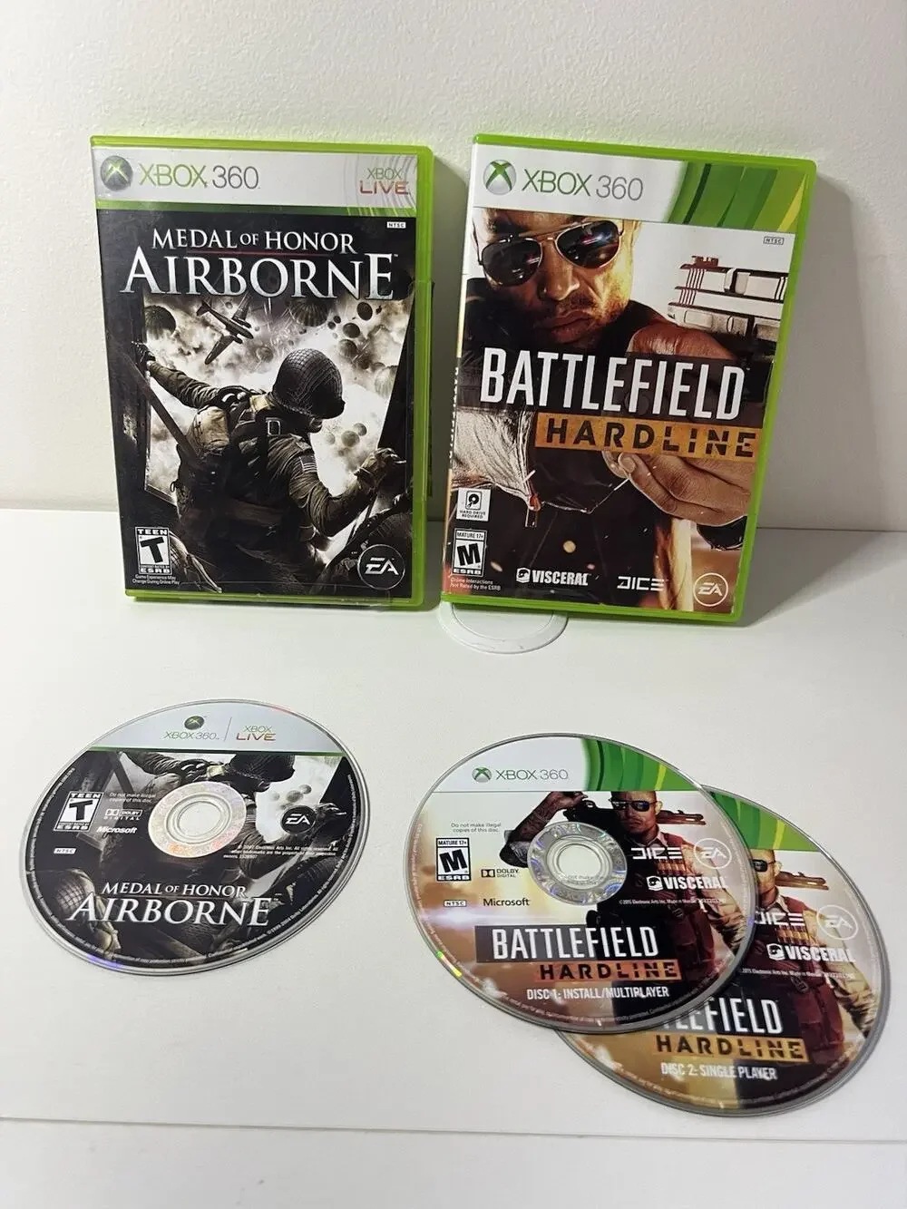 Lot of 2 Xbox 360 Games Medal of Honor Airborne 2007 & Battlefield Hardline 2015